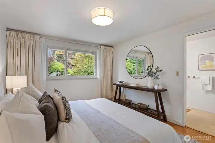 Pocket door connects primary to main floor bath.