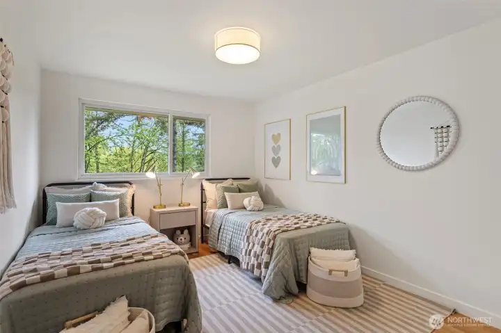 Third bedroom freshly painted, new overhead light, new baseboard trim.