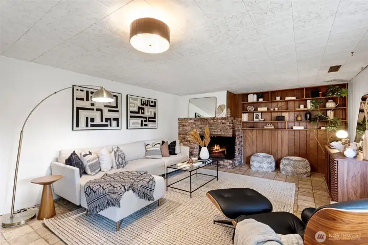 Brick wood burning fireplace adds ambiance on cozy nights.