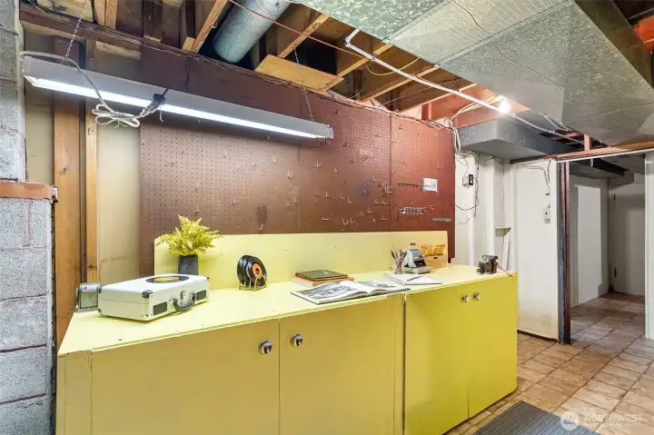 Workbench and storage in the basement.