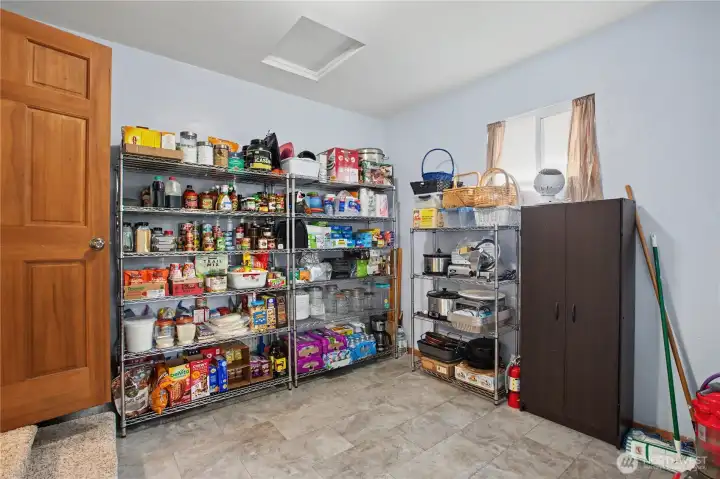 walk-in pantry and mudroom with backyard acess