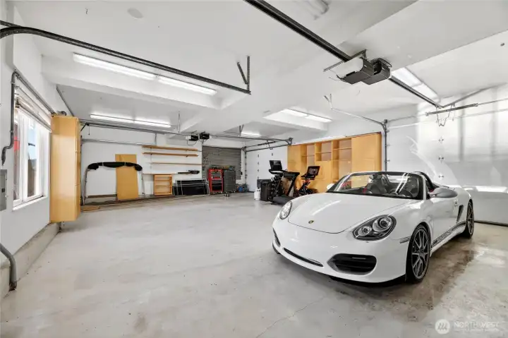 Let's talk about the garage space in this home. The 1st garage has room for 3 cars and all the toys.