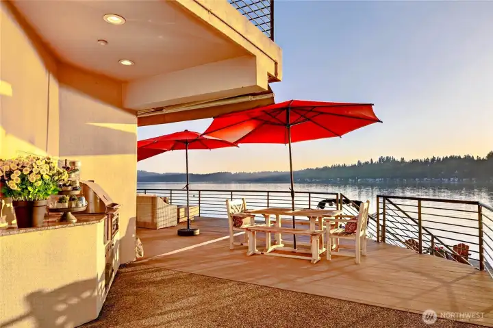 Grill, gather, and watch the lake go glassy at golden hour. The built-in outdoor kitchen and expansive terrace were made for long summer evenings.