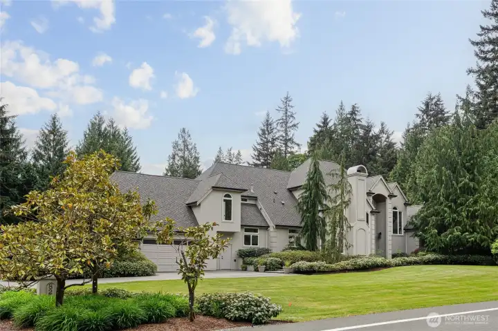 Large flat 1.77 acre lot with fully irrigated mature landscaping.