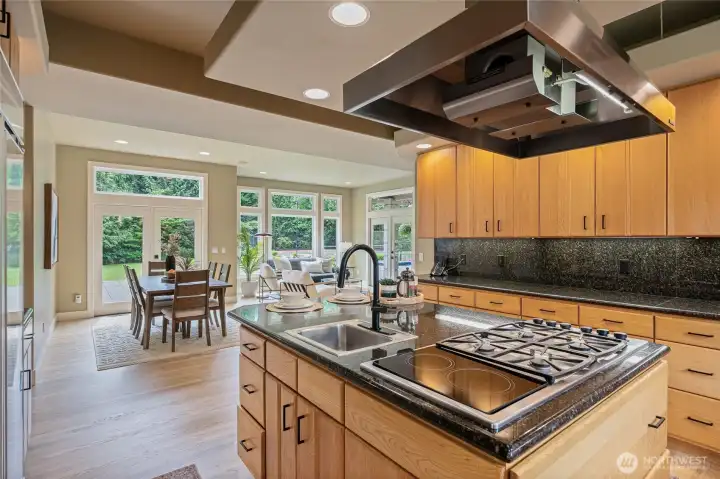 Kitchen open to Informal Dining Room & Family Room, great for gatherings.