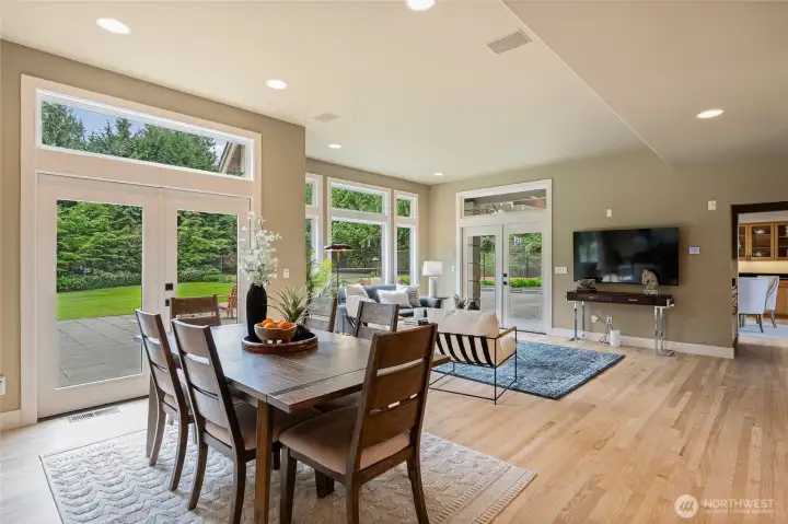 Family Room and Dining Room with abundant windows for natural light.