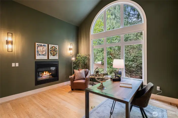 True Study with gas fireplace and calming ambiance.