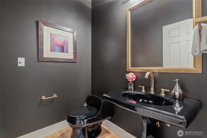 Designer Powder Room is a showpiece for this home.