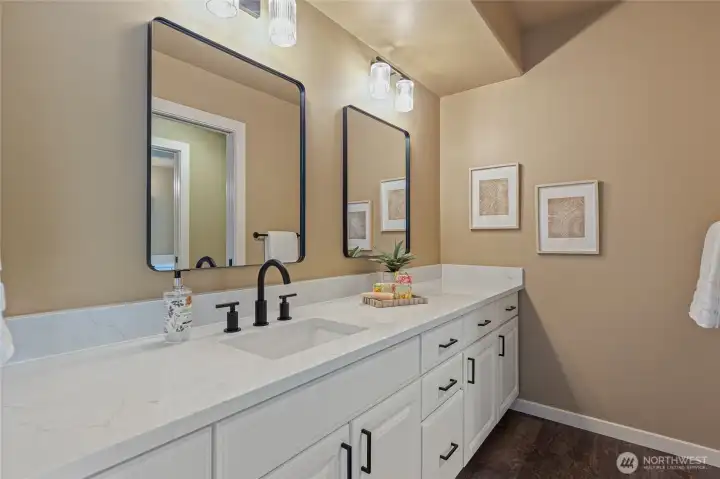 Upper level spare bedrooms have dedicated vanities for each bedroom and shared wet room & shower.