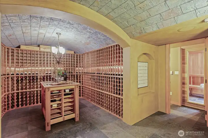 Downstairs you will find a temp controlled dream Tuscany Inspired wine cellar.