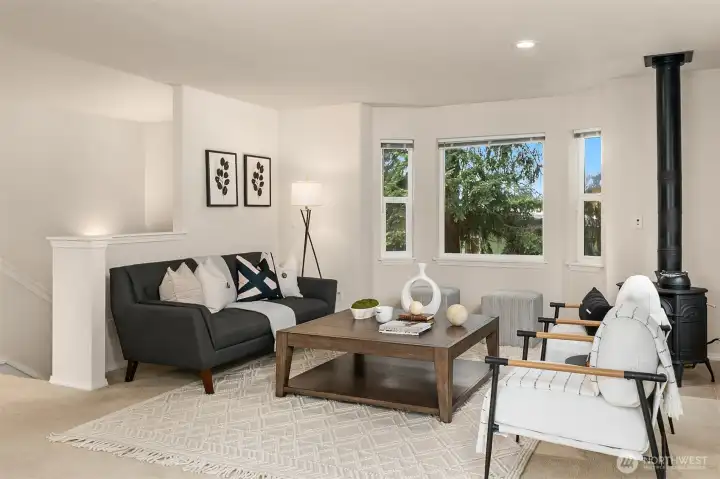 Inviting atmosphere for both intimate living and larger gatherings.