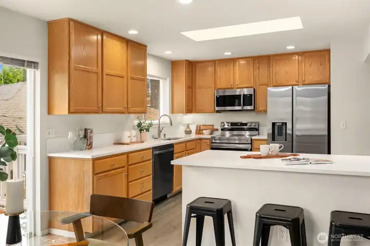 Thoughtfully curated "Chef's" kitchen with new counter tops, new sink and stainless steel applaicnces.