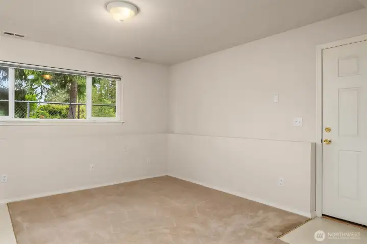 Separate entrance to the spacious suite which includes a full bath and its own kitchen.