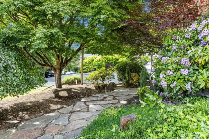 Custom walkway to the ADU, surrounded by an incredible backyard oasis.