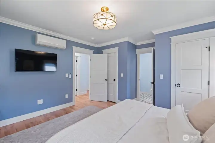 Bathed in natural light and thoughtfully positioned for privacy, the primary suite offers a peaceful retreat. Bathed in natural light and thoughtfully positioned for privacy, the primary suite offers a peaceful retreat.