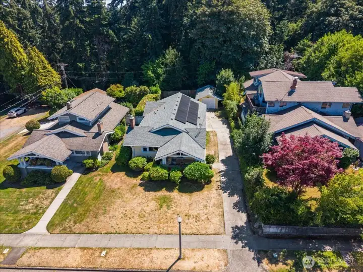 Beautifully framed by nature, the backyard feels worlds away while remaining minutes from city conveniences. Beautifully framed by nature, the backyard feels worlds away while remaining minutes from city conveniences.