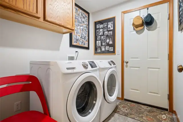 New washer/dryer in laundry room on way to garage.