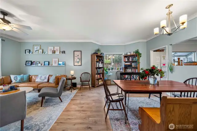 This is the living room / dining room with LVP flooring.