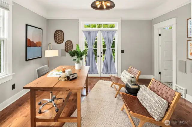 This main floor office space has been used as an office, as a media room, as a guest room. The french doors lead ot the gorgeous backyard and there is an adjacent bathroom that was added by these sellers. Built in speakers here as well!