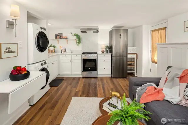 The basement apartment has its own laundry and gorgeous kitchen and built in table.