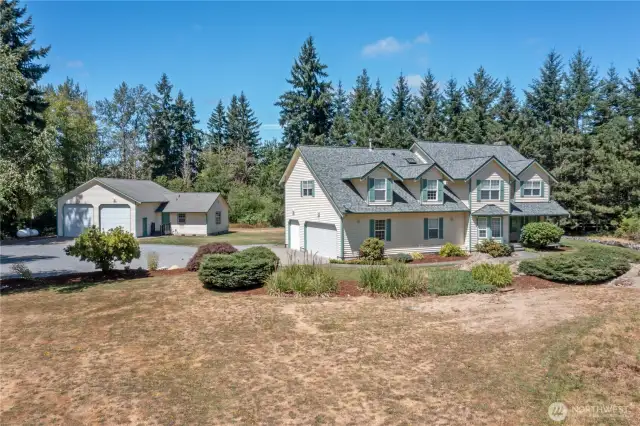 Welcome home to this gorgeous estate offering a main home plus detached garage w/ office space!