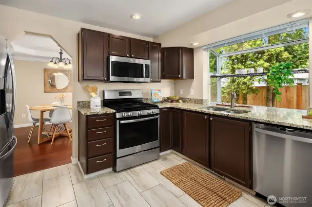 Kitchen w Fun Garden window to the backyard