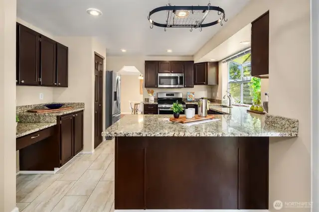 Granite Countertops w the Dining room in the way back