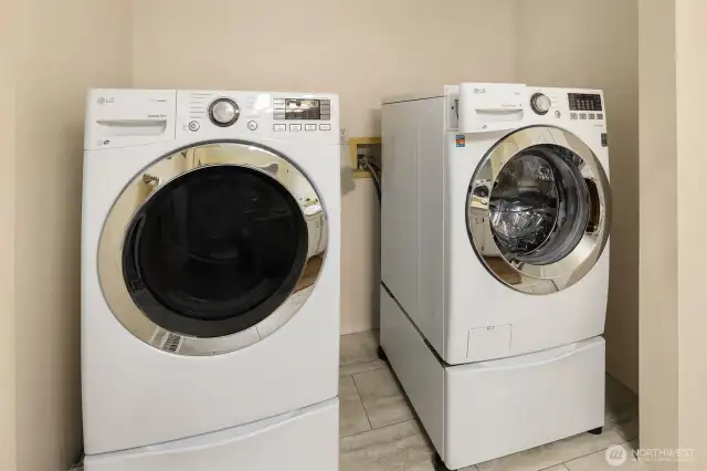 Washer Dryer built in to the Half Bath adjacent to the Garage, Fireplace Den
