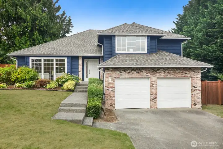 6342 S 298th Place sits elegantly on a corner lot in the hillside cul-de-sac of Bristol Heights.