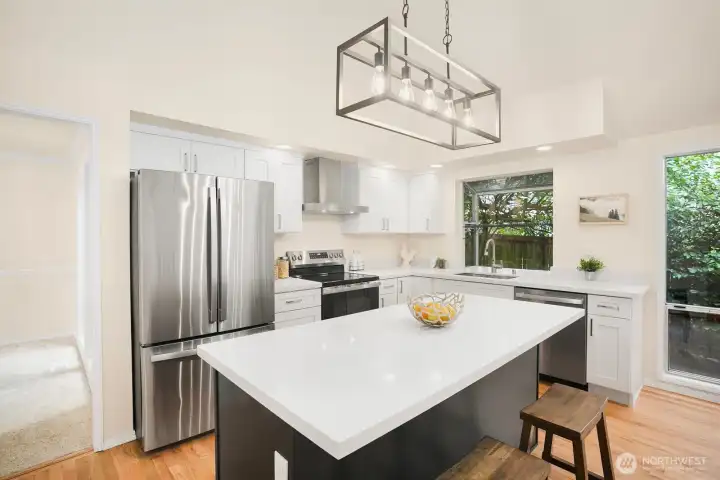 The kitchen has recently had a complete makeover with all new cabinets, all new stainless steel appliances, refinished hardwoods, new light fixtures, large undermount modern stainless steel sink.  It's a beauty!