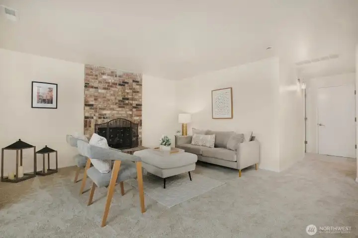 The family room is a large space.  The fourth bedroom is on the left and access to the 2-car garage is straight ahead.