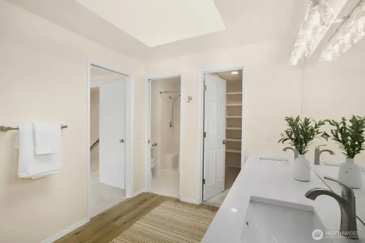 The Primary Bathroom has a wonderful skylight, allowing natural light.