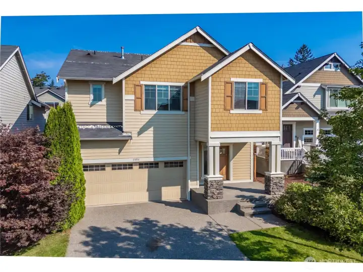 Covered front entry and driveway parking