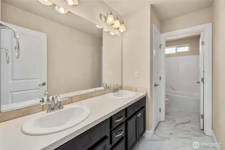 Upstairs full bath with private toilet room