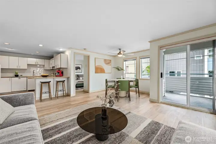 Open Floorplan throughout Living Room and Dining Space.