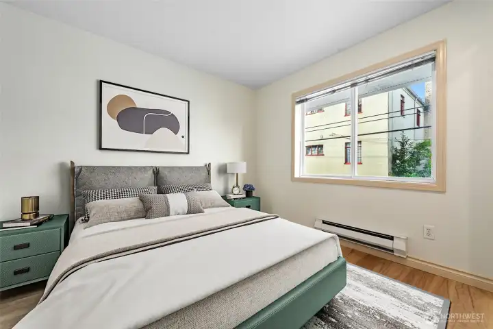 Bedrooms are located on opposite sides of the Unit.  This one is off the Living Room and has West Exposure.