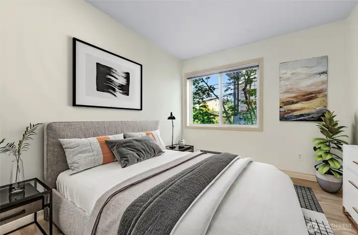 This Bedroom is located off the Entry Hall and has a Treed outlook facing North.