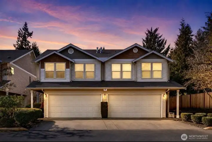Front of townhome  - 4 parking spots and entrance on the left.