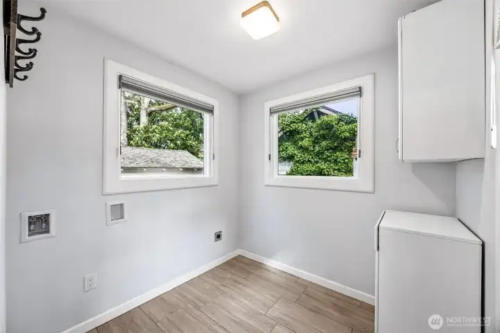 Main floor laundry hook-ups and mudroom to patio dining.