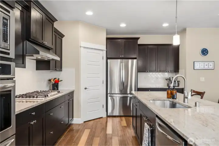 Corner pantry next to Fridge