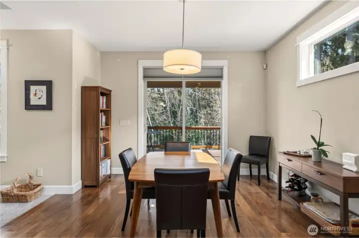Dining area also with hardwoods