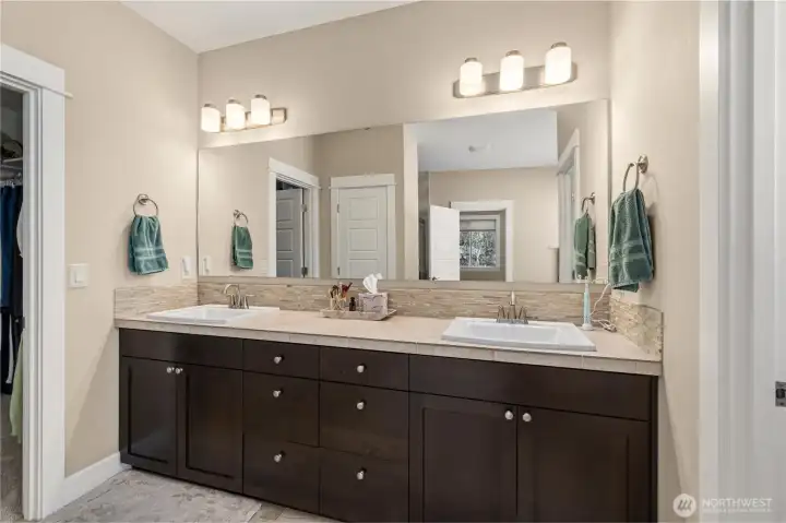 Five piece primary bathroom - double sinks, granite counters, tile backsplah