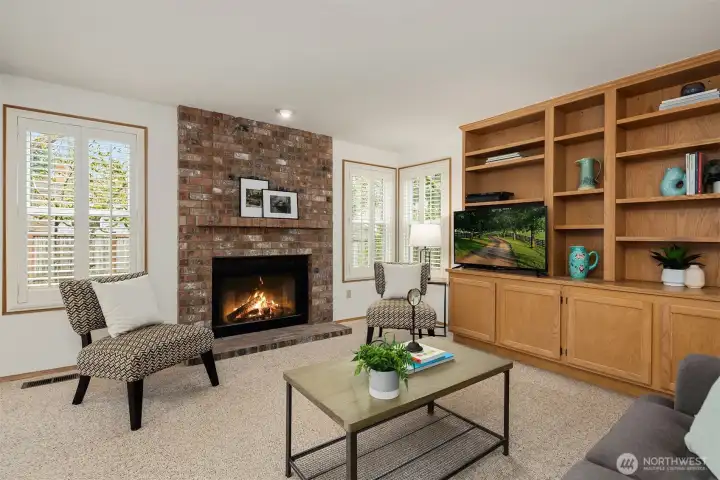 Family Room with built in bookshelves and storage.