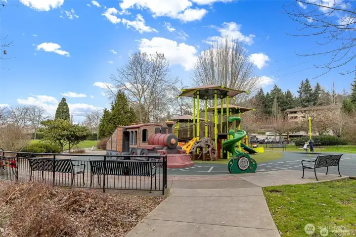 Mercerdale Park is a vibrant 12-acre community centerpiece in Mercer Island’s Town Center, offering something for everyone. You’ll find the beloved “Train Park” playground, the Kirk Robinson Skate Park, wide open lawns, picnic areas, paved walking paths, outdoor fitness stations, and a native plant garden. It’s also home to many of the island’s signature gatherings, including Summer Celebration, seasonal farmers markets, and the annual holiday tree lighting.