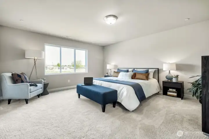 Oversized primary suite with sitting area. Photos are for representational purposes only.  Colors and finishes may vary.