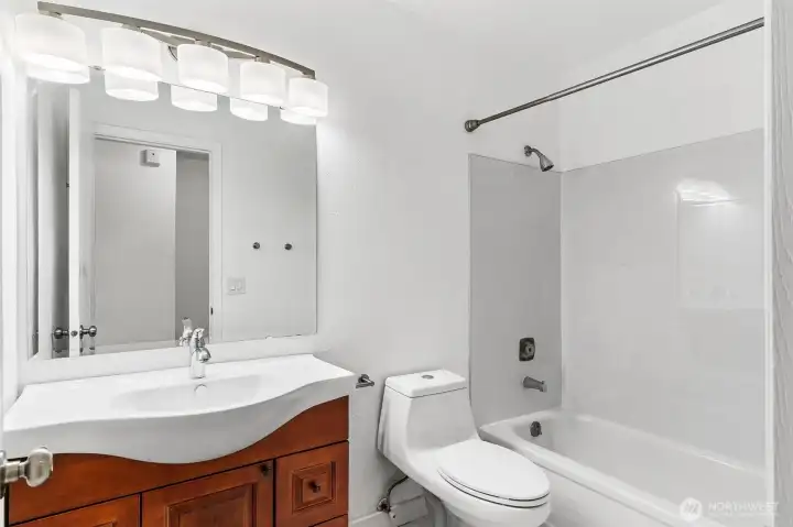 Newly tiled tub surround - Virtually staged