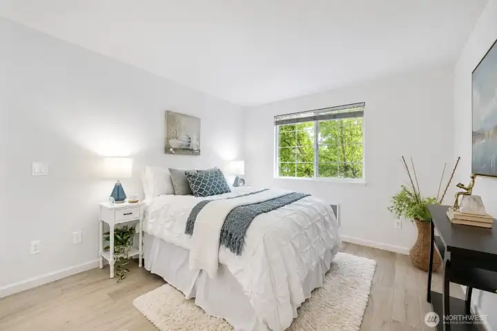 Large primary bedroom with huge walk-in closet