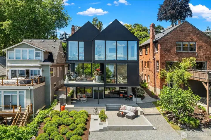 Home is modern from the back focused on Lake Washington views. Home is modern from the back focused on Lake Washington views.