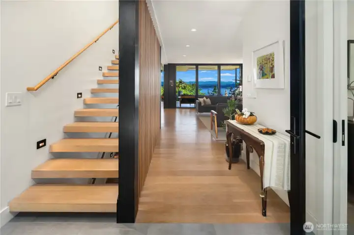 Views from all levels. Floating stairs to 3 bedrooms and 2 baths. Views from all levels. Floating stairs to 3 bedrooms and 2 baths.