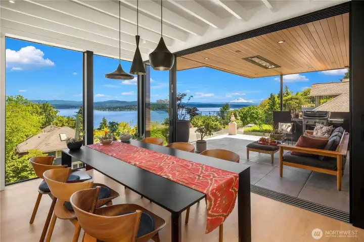 Tom Dickson dining lights. Door fully opens to covered deck. Tom Dickson dining lights. Door fully opens to covered deck.